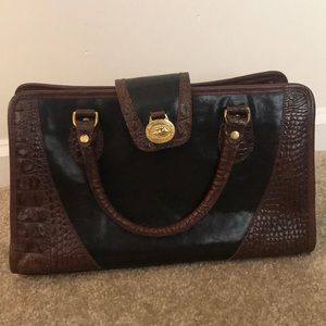 Brahmin black leather and brown leather accents